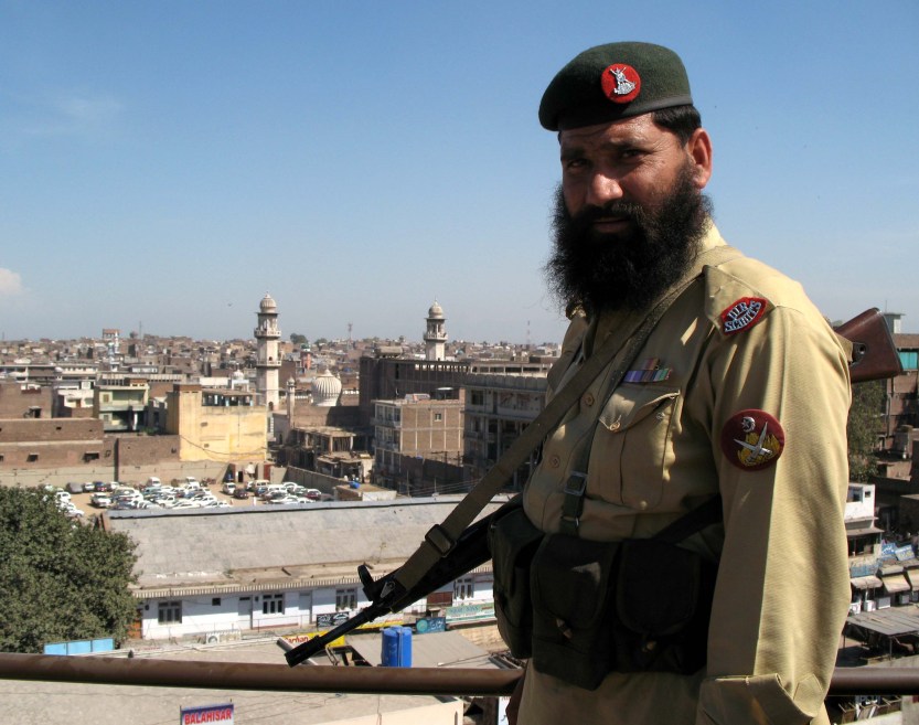 Member of Frontier Corps overlooking Peshawar, Pakistan